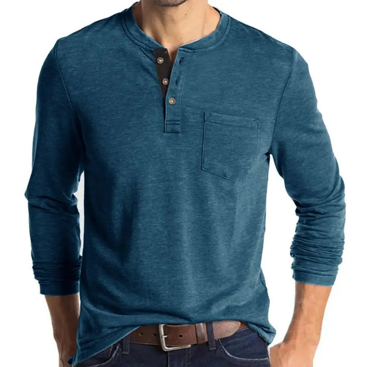 Herre langermet Henley t-skjorte i mykt ensfarget stoff med brystlomme, perfekt for høsten.