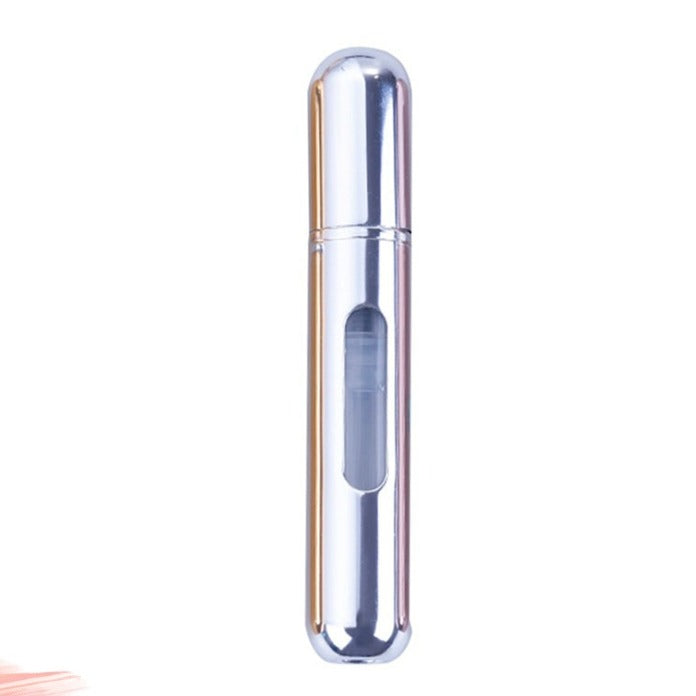 Perfekt gave: påfyllbar mini parfymebeholder. Praktisk og stilig tilbehør for alle.