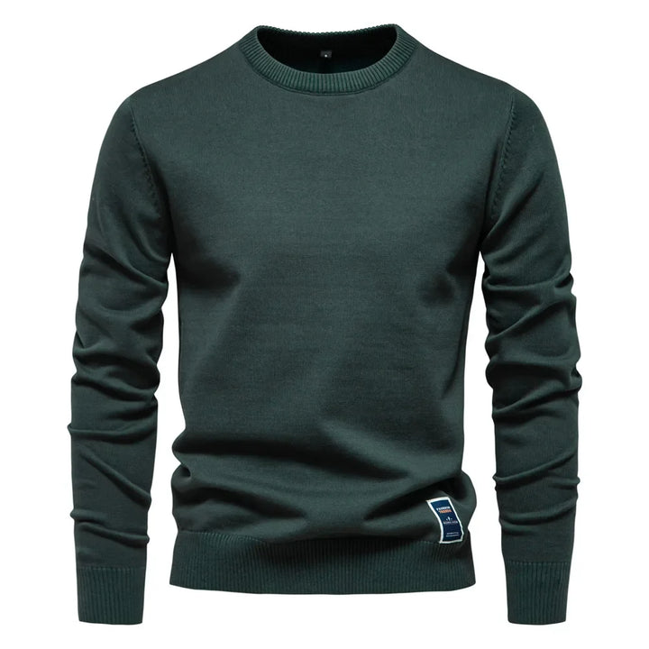 Beige herregenser, klassisk rund hals i varm ullblanding. En stilig og myk vintergenser.