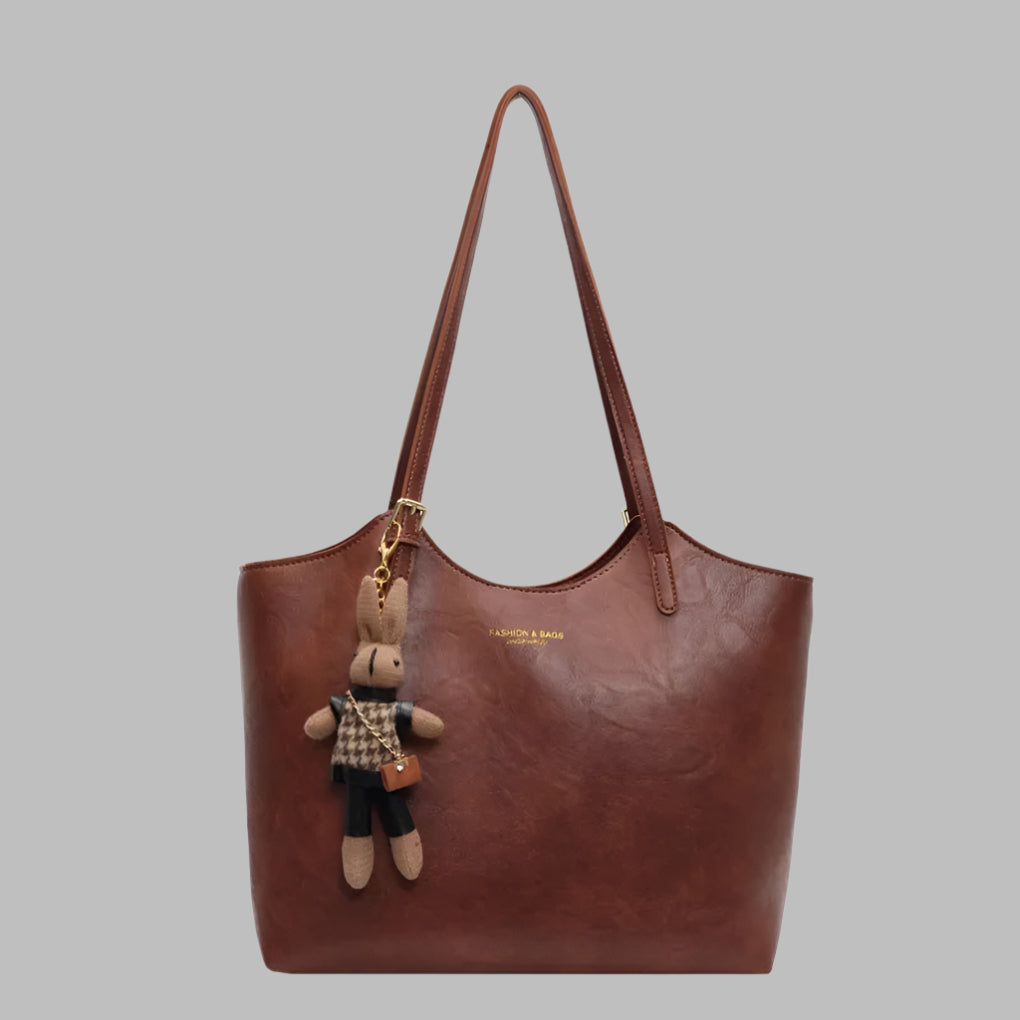 Elegant dame vintage skulderveske i skinn. Romslig toteveske for kvinner, perfekt for hverdag og mote.