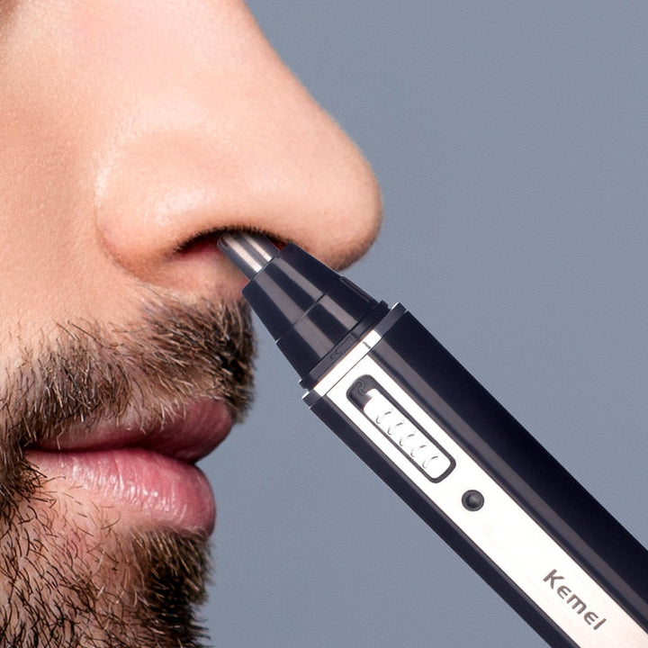 Mann trimmer skjegg med 4-i-1 ansiktstrimmer. Presis og oppladbar for enkel skjeggstyling.
