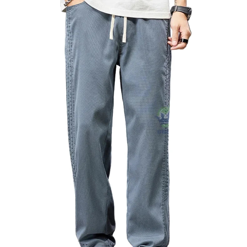 Stilige herre joggebukser i lyocell, store størrelser. Vide ben, perfekt for en casual look om sommeren.