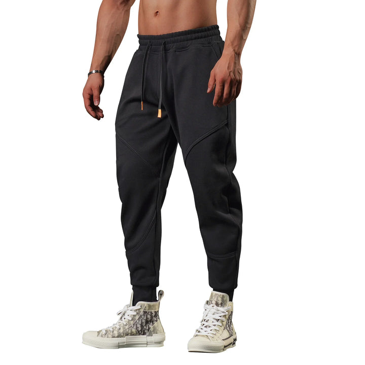 Sporty hverdagsbukse for menn, slim fit, med komfort og funksjonalitet.