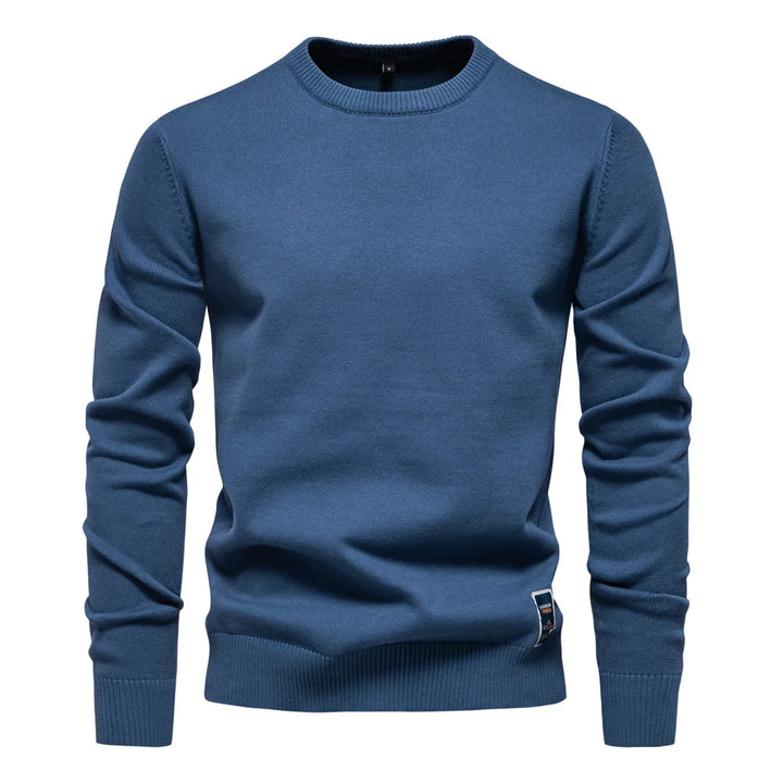 Varm og elegant herregenser i ullblanding, rund hals. Ideell for hverdagsbruk og fine anledninger.