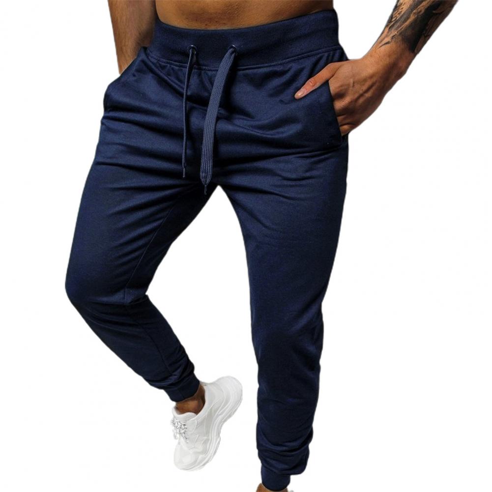 Tidløs herre joggebukse med slim passform og sporty sidelinjer, i premium kvalitet.