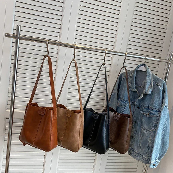 Chic dame skulderveske, romslig og elegant. Klassisk vintage design som passer perfekt til enhver anledning.