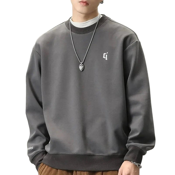 Komfortabel herre høst genser med rund hals, perfekt for en avslappet, men stilfull business casual look.