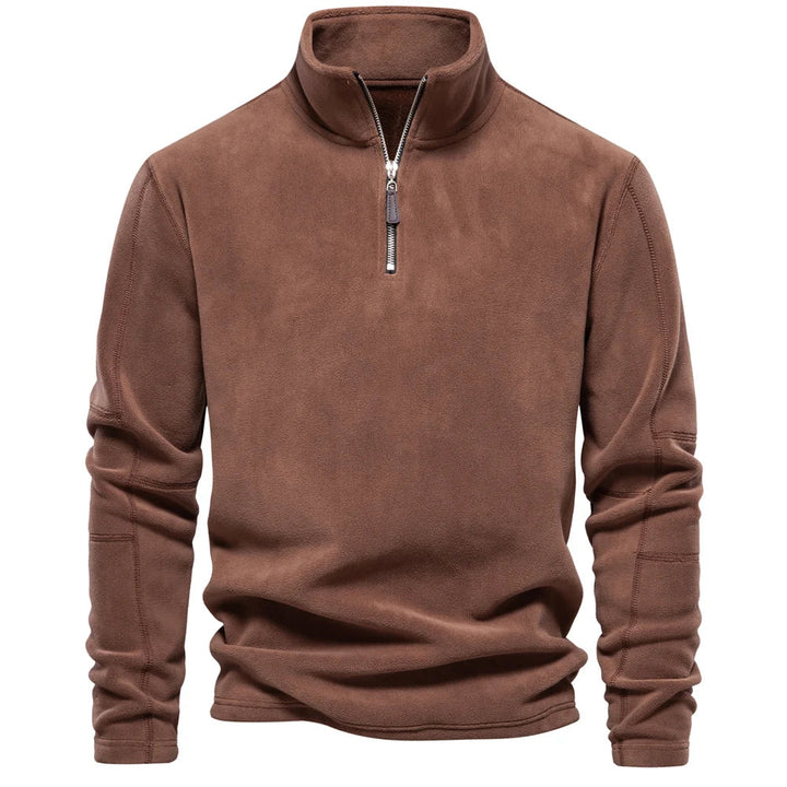 Komfortabel og varm herre fleecegenser for hverdag og tur. Halv glidelås og softshell-stil gir sporty look.