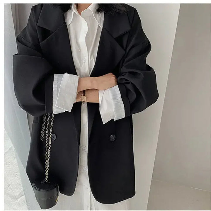 Dobbelspent vintage dressjakke for damer. Elegant blazer med løs passform, perfekt høstklær.