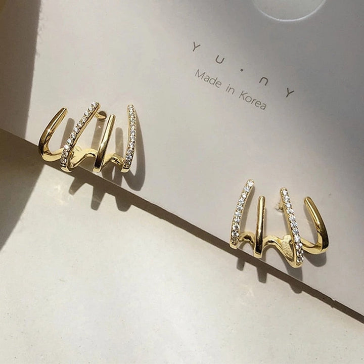 Elegant glitrende øredobber med illusjon av flere piercinger, perfekt gave til kvinner.