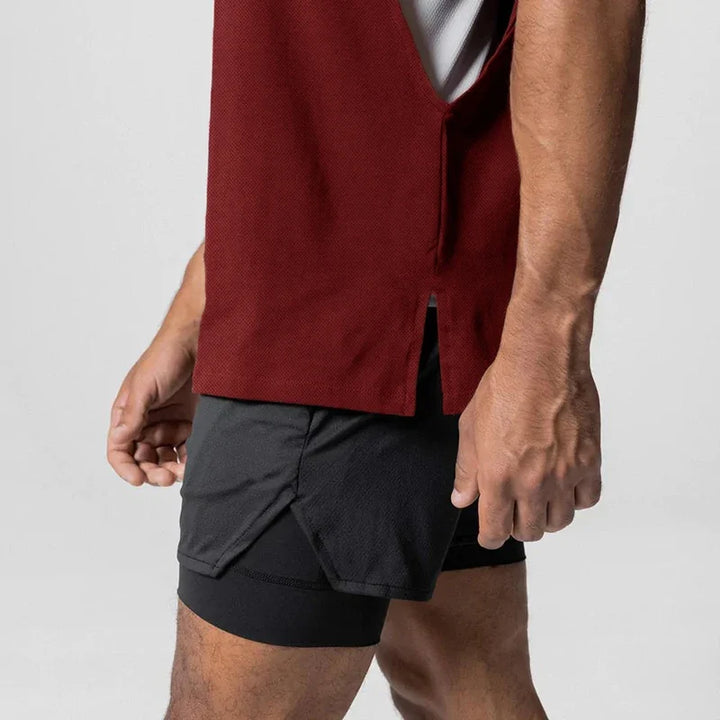 Herre singlet svart, med åpen side, optimaliserer komforten under gym og fitnessøkter.
