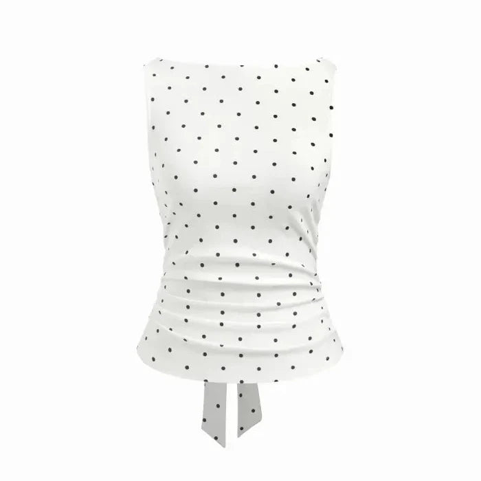 Dame hvit prikket crop topp med flatterende båthals, ermeløs og dekorativ knyting. Perfekt for sommer, vintage look.
