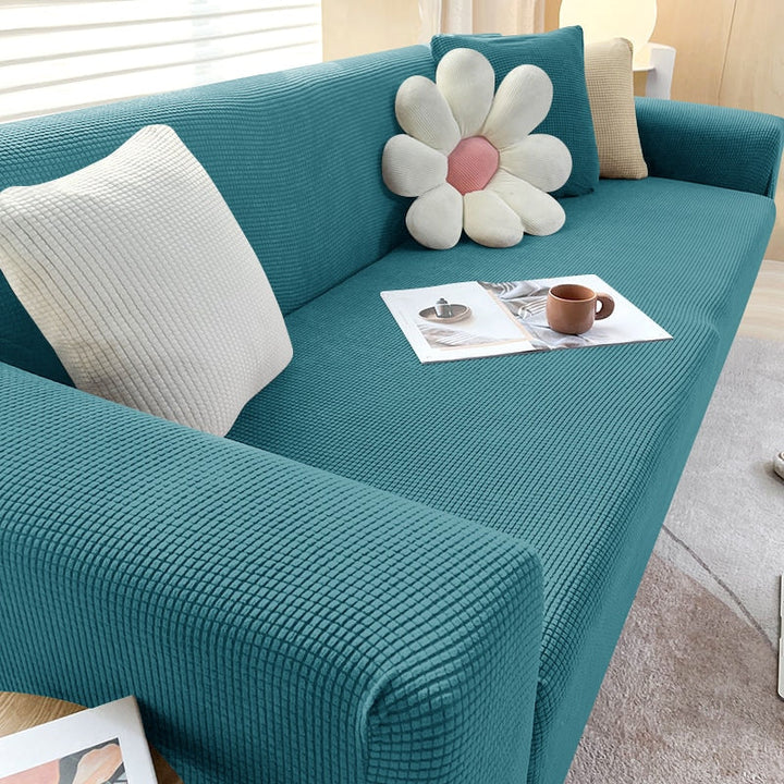 Hjemmeinnredning: Grått teksturert sofatrekk som forvandler sofaen.