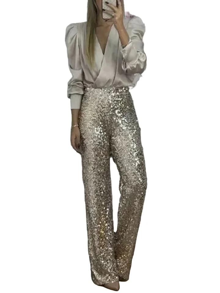 Dame festbukser med glitrende paljetter, komfortabel elastisk midje. Perfekt for kveldsantrekk og partymote.