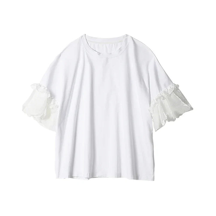 Komfortabel feminin bluse med løs passform og unike lantern-ermer, ideell for sommerdager.