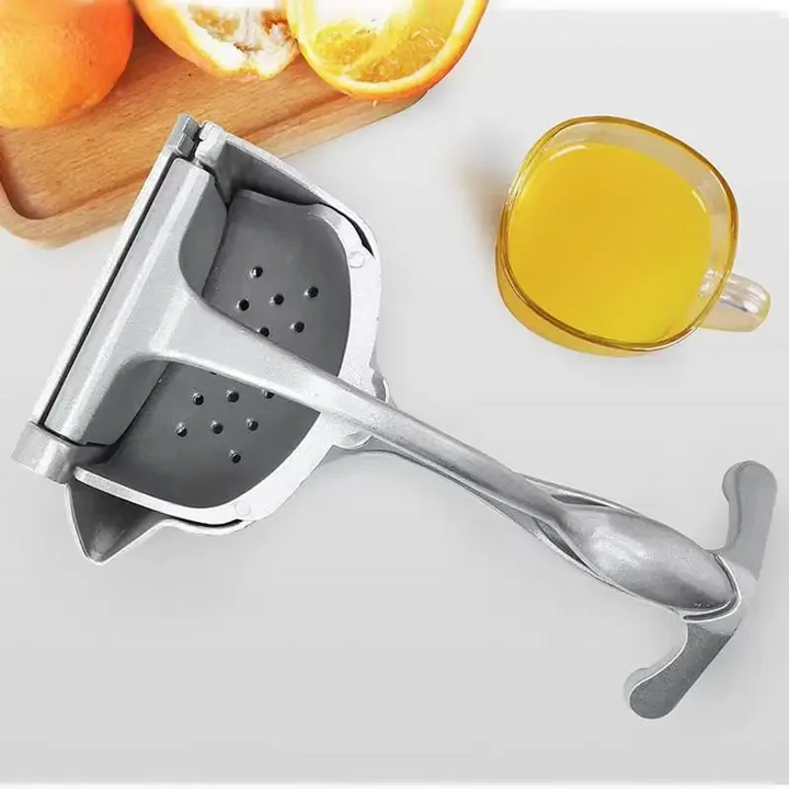 Solid aluminium håndpresse for frukt. Effektivt kjøkkenverktøy for daglig juice.