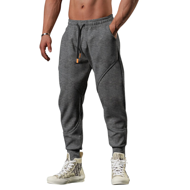 Allsidig herre joggebukse, slim fit, passer til alle sesonger og aktiviteter.