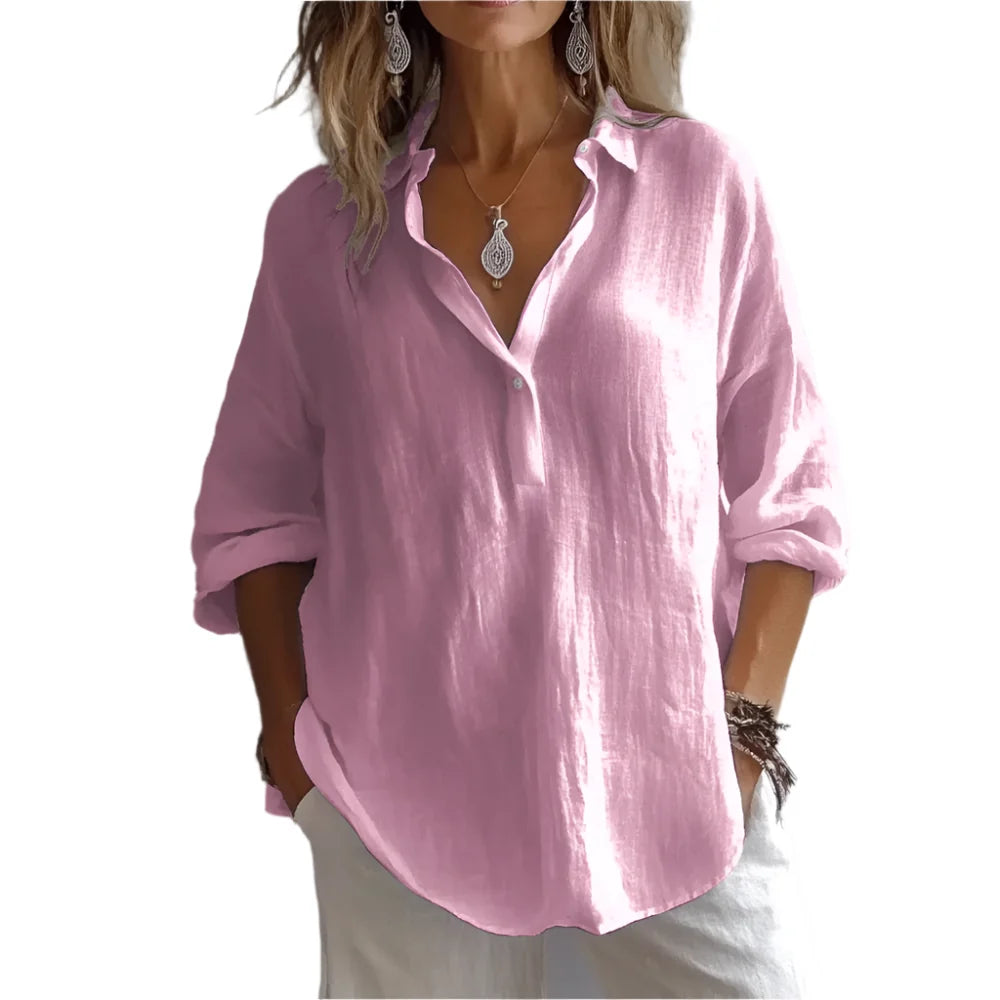 Elegant oversized dameskjorte med V-hals, perfekt for vår og sommer. Løs passform, pustende stoff.