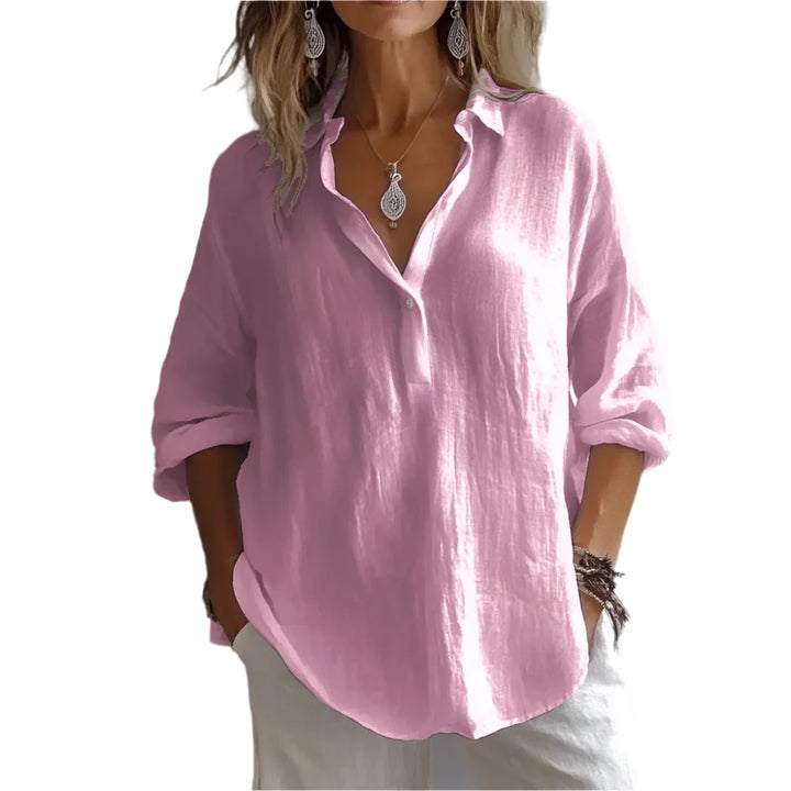 Elegant oversized dameskjorte med V-hals, perfekt for vår og sommer. Løs passform, pustende stoff.