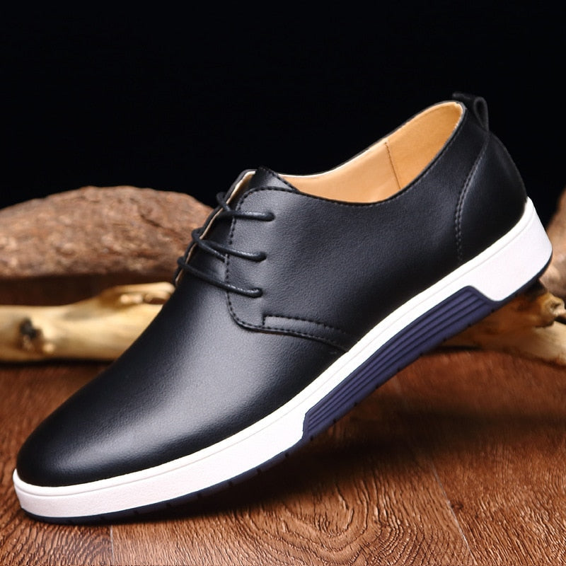 Klassiske Oxford herresko i brunt skinn, elegant design for menn med fokus på komfort.
