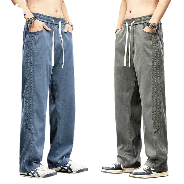 Herre lyocell sommerbukser, løs passform, elastisk midje. Komfortabel streetwear-stil for menn.
