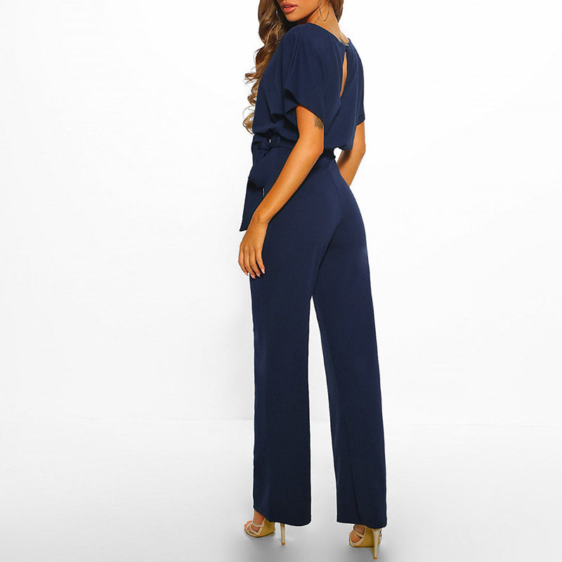 Elegant svart damejumpsuit, perfekt festantrekk. Stilren heldress for kveldsbruk og mote.
