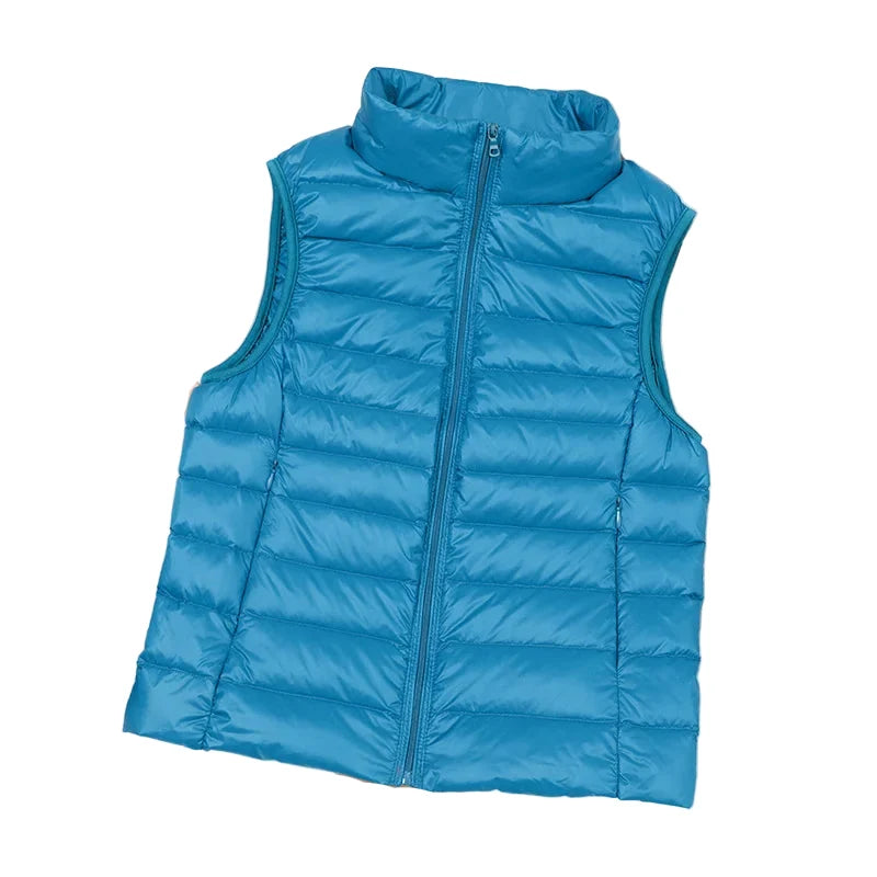 Hvit ultralett dame dunvest i andedun for høst/vinter. Varm puffer vest, plussize til 8XL.