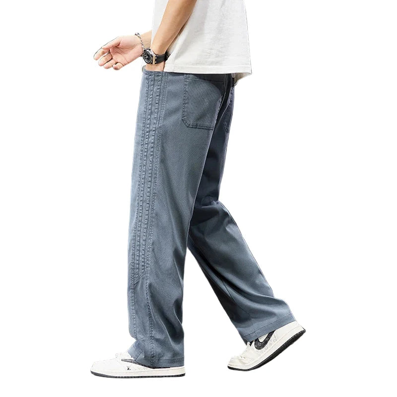 Sommerbukser for menn, lyocell stoff, vide ben. Jogger-stil med komfortabel passform for hverdagsbruk.