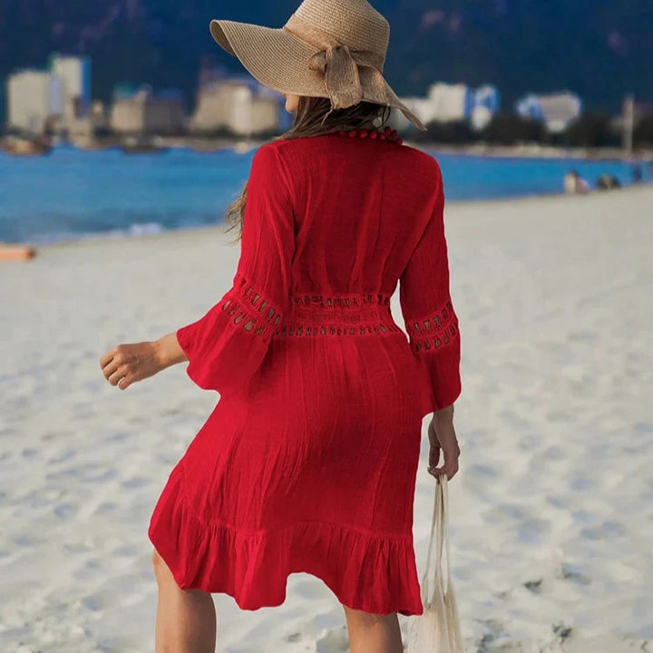 Hvit heklet blondekimono, en trendy cover-up for dame og strandmote.