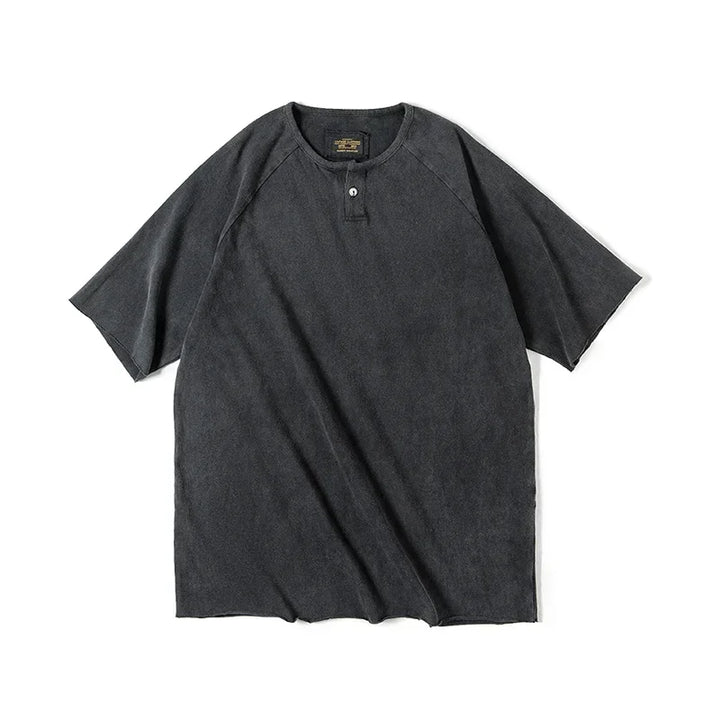 Grønn/svart herre Henley t-skjorte i oversized passform. Vintage vasket bomulls tee for streetwear og workwear stil.