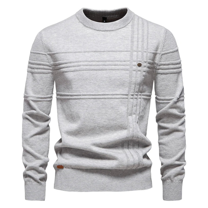 Elegant stripet strikkegenser i bomull til herre. En tidløs rundhalset genser for klassisk stil.