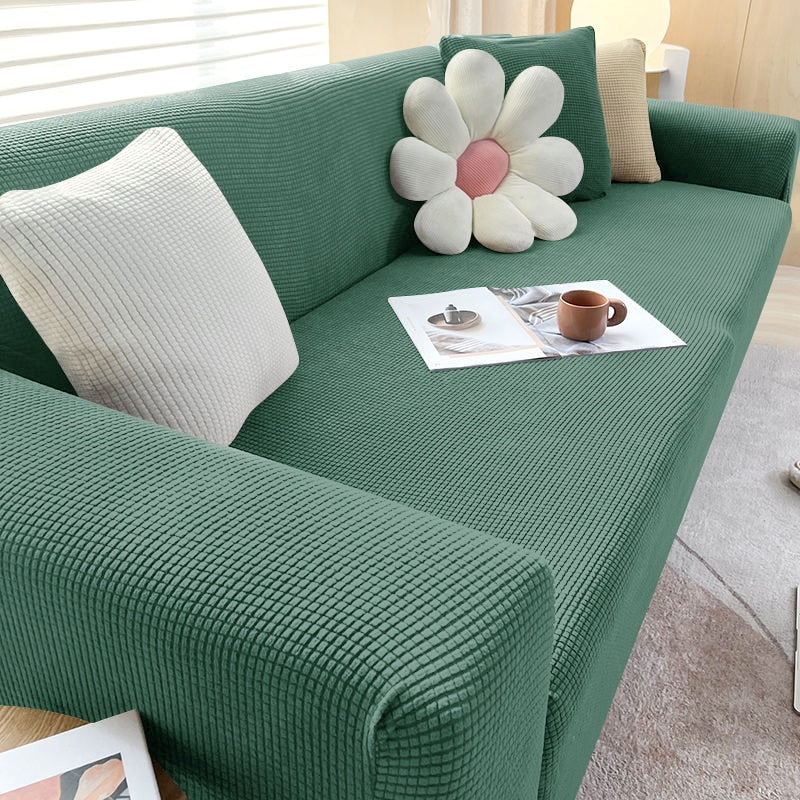 Teksturert stretch sofa trekk som passer til ulike sofamodeller og størrelser.