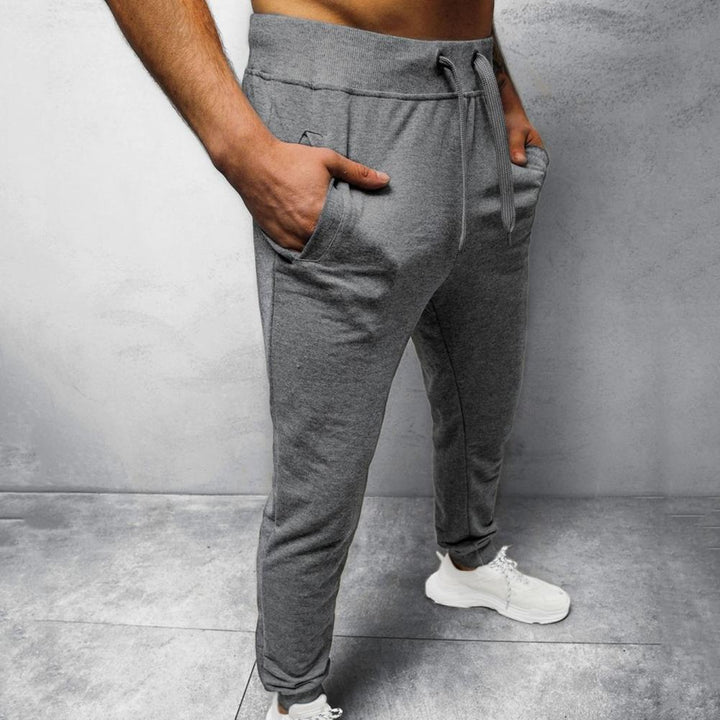 Herre slim fit joggebukse med sidelinjer i pustende bomullsblanding, trening/fritid.