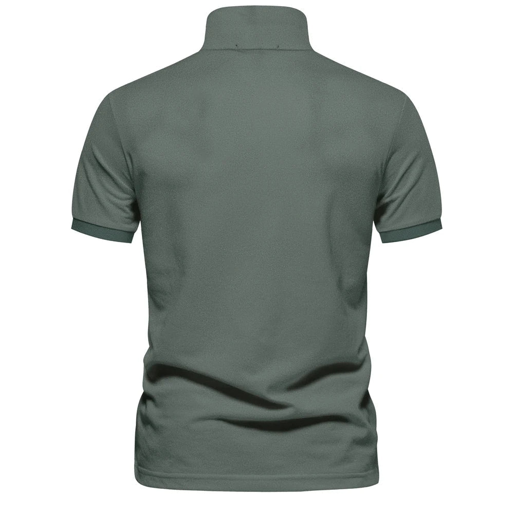 Mørkegrønn klassisk herre pique polo i bomull, perfekt for casual look.