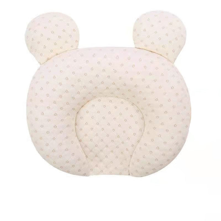 Ergonomisk babypute for nyfødte, forhindrer flatthode. Gir komfortabel støtte til spedbarns hode og nakke.