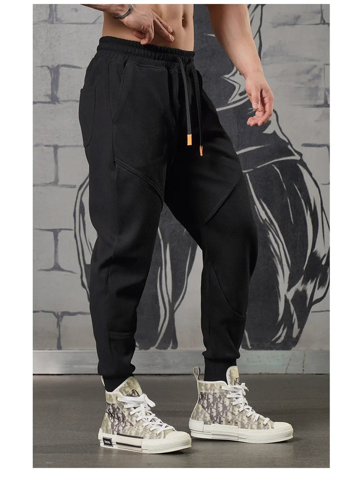 Herre løpebukse, slim fit, fukttransporterende og lett materiale.