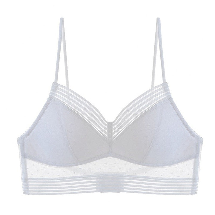 Innovativ ryggløs blonde-BH i myk mesh, gir perfekt støtte og er usynlig under kvelds- og sommerantrekk.