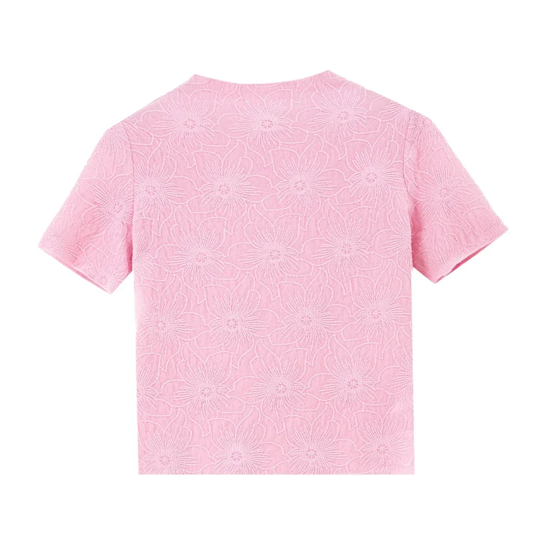 Rosa dame topp i strikket jacquard med elegant blomstermønster. Slimfit design og mockneck, ideell for sommer.