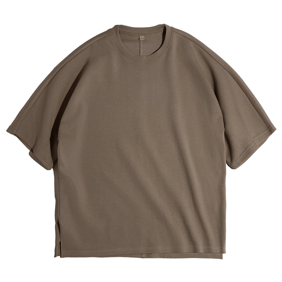 Tungvekt herre t-skjorte i piqué bomull med løs passform. Ideell for casual retro stil og hverdagskomfort.