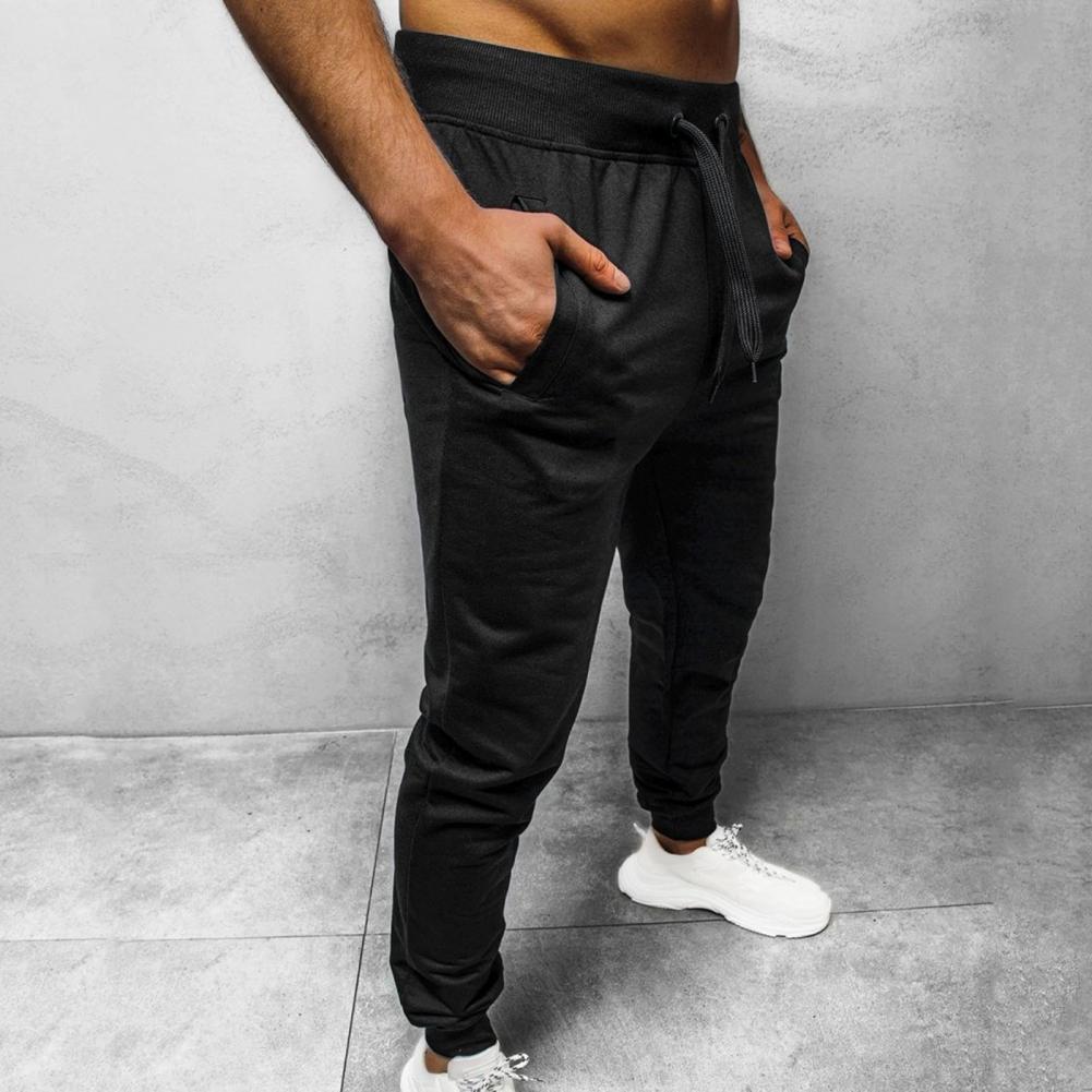 Herre joggebukse med sidelinjer, kombinerer slim fit med ultimat komfort.