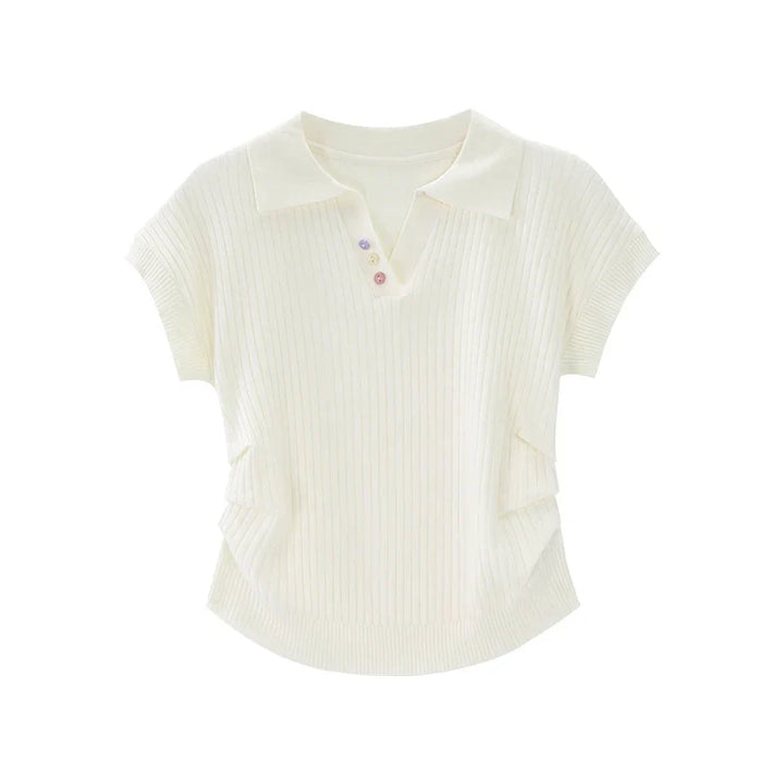 Dame aprikos strikket polo t-skjorte med løs passform. Elegant hverdagstopp, ideell for kontorstil og komfort.