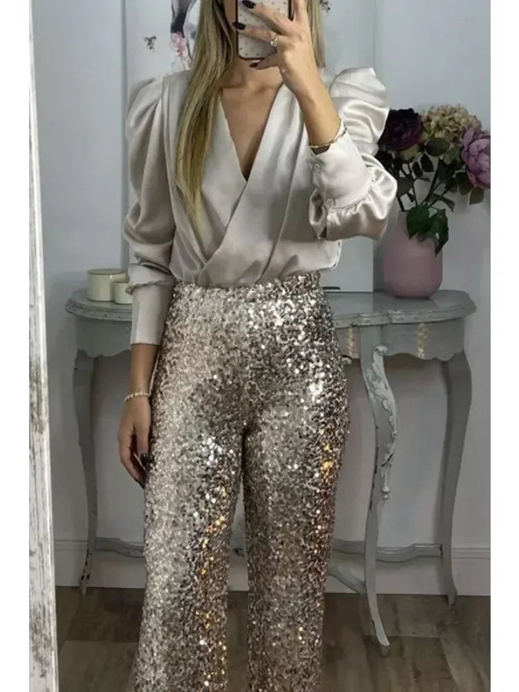 Glamorøse glitterbukser for dame, perfekt til fest og formelle anledninger. Komfortabel passform og stilrent design.