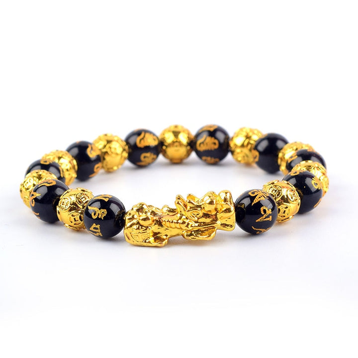 Kraftfullt svart obsidian armbånd. Tiltrekker rikdom og positiv energi.