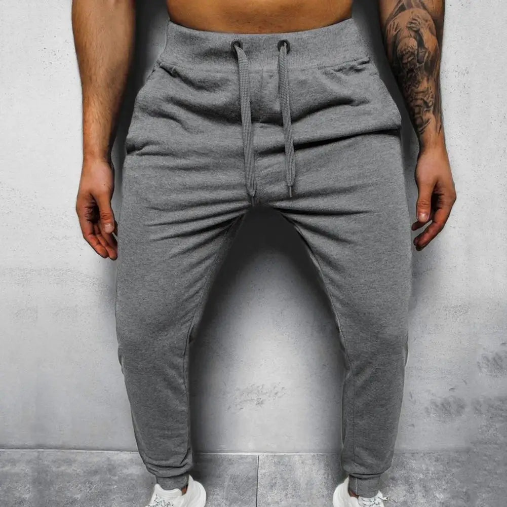 Allsidig herre joggebukse med sidelinjer, perfekt for en sporty og avslappet look.