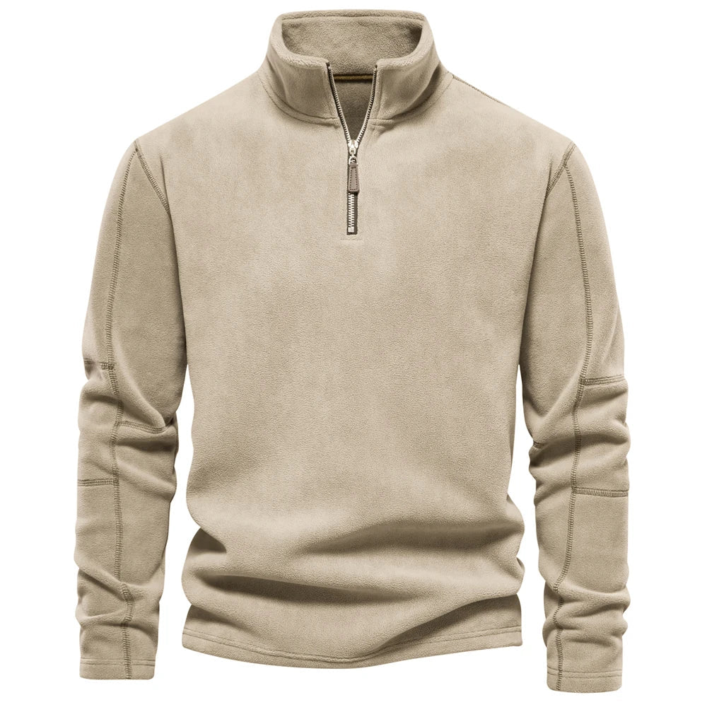 Isolerende herre fleecegenser med halv glidelås, et varmt mellomlag som ligner softshell. Høy komfort.