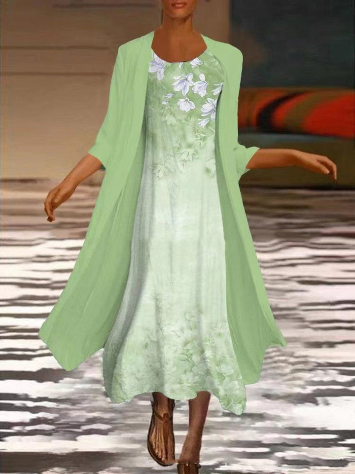 Ermeløs elegant festkjole, blomstret design for vår- og sommerselskap.