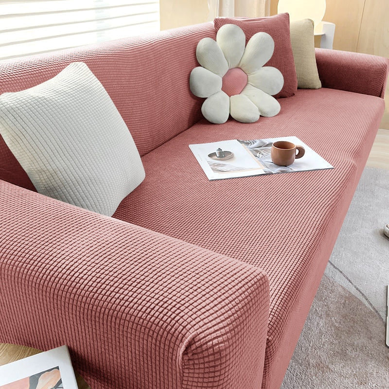 Sofa med nytt teksturert stretch trekk i en moderne stue, gir frisk look.