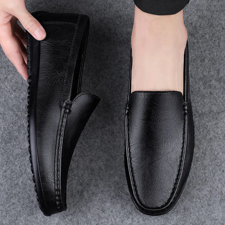 Svarte herre loafers, allsidige mokasiner for både hverdag og fest.