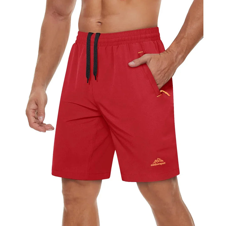 Sporty herre fritidsshorts, pustende og lett, med praktiske glidelåslommer.