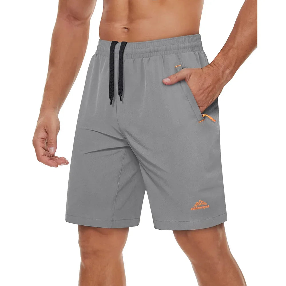 Svart herre shorts, hurtigtørkende og med glidelåslommer, for all trening.